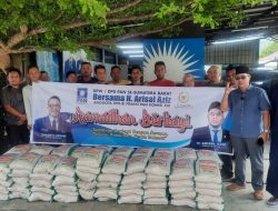 Anggota DPR-RI H. Arisal Aziz Serahkan Bantuan 255 Ton Beras