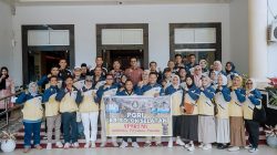 Ketua PGRI Kabupaten Solok Selatan Asbandi, S.Pd, M.Pd, bersama Bupati Solok Selatan H Khairunas dan Kontingen Porsenijar PGRI Kabupaten Solok Selatan.
