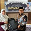 Hadiri Halalbihalal, Ketua DPRD Muharlion Serahkan Bantuan Laptop  
