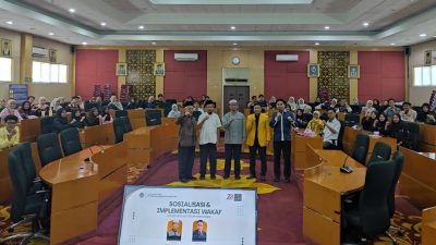 Foto bersama setelah kegiatan Implementasi Wakaf untuk Kesejahteraan Mahasiswa.