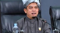 Ketua DPRD Kota Padang Muharlion, S.Pd.